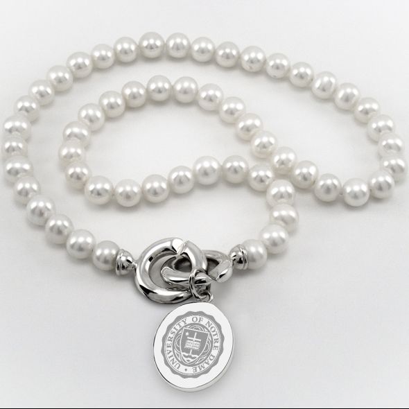 Notre Dame Pearl Necklace with Sterling Silver Charm - Image 1
